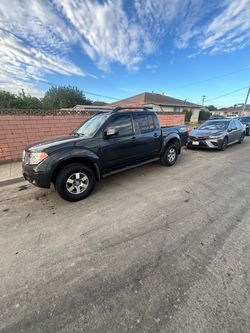 2013 Nissan Frontier 4x4, 79,203 miles, good condition, everything works, leather seats.