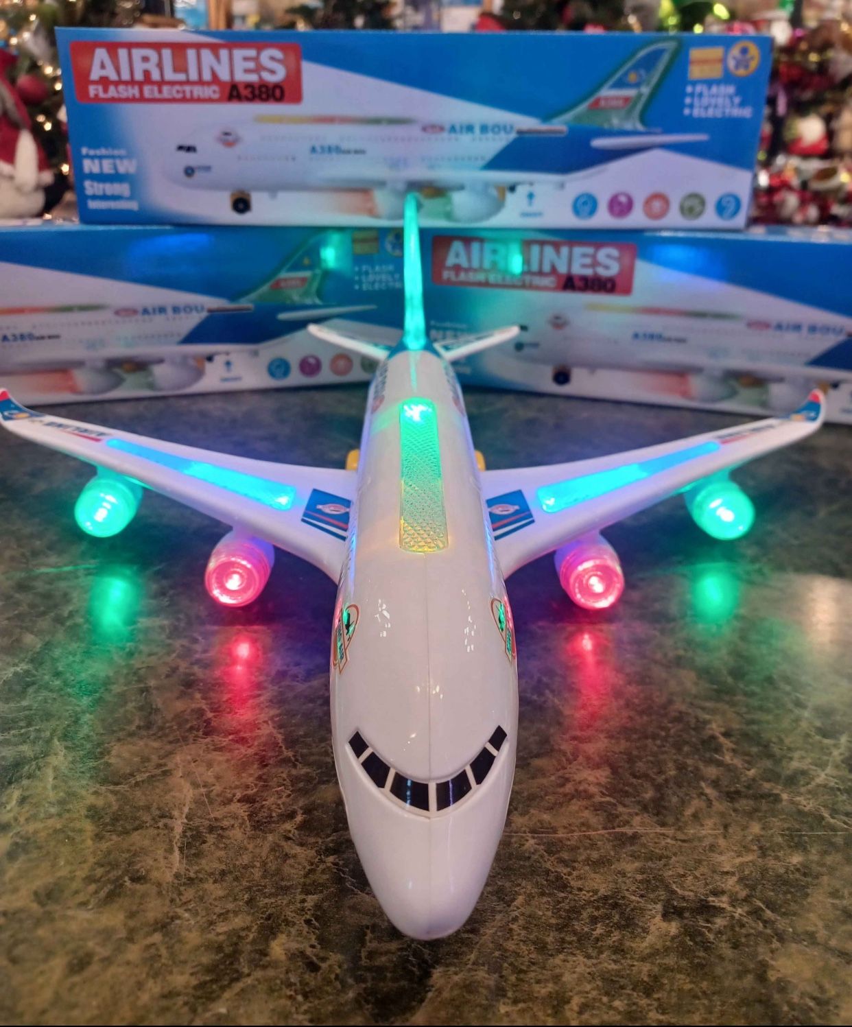 New kid's flashing electric airplane rolls light's up makes noise.