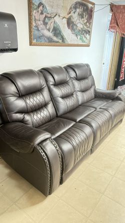 Leather couch with recliners