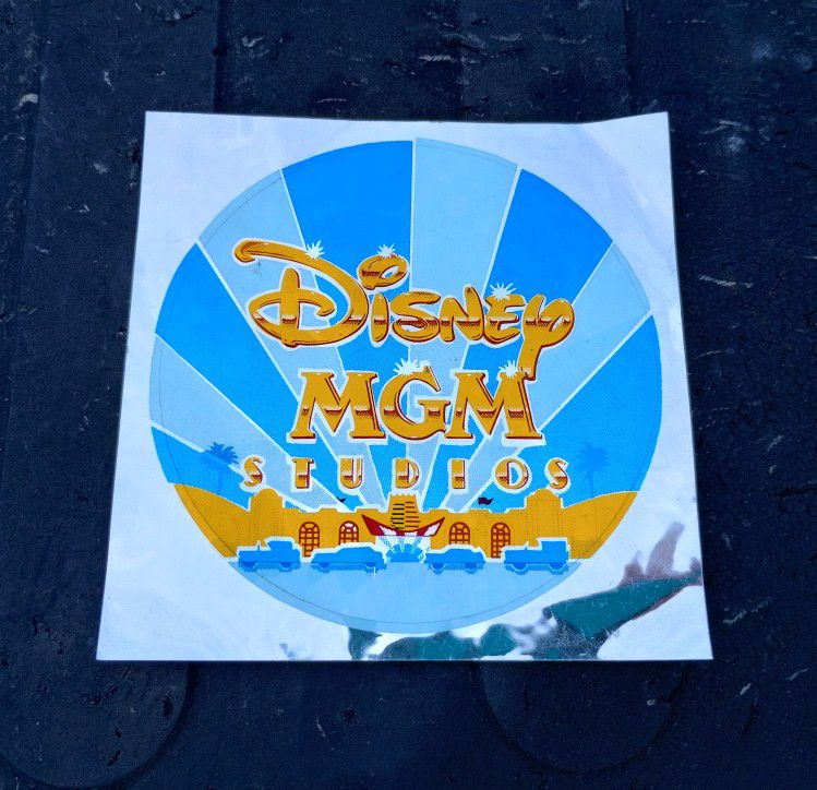 Disney/MGM chrome backed sticker, 4"