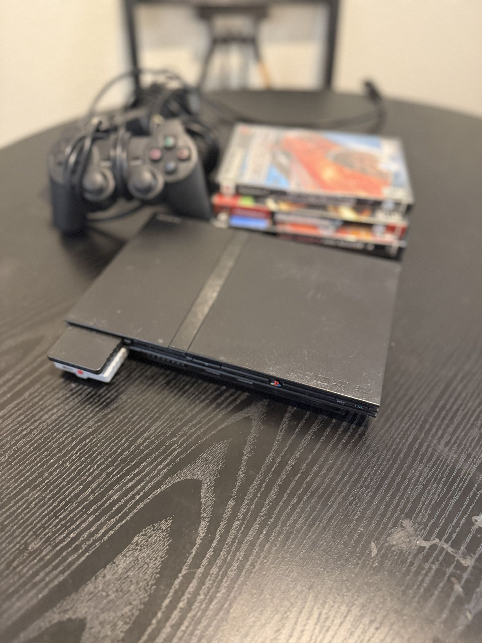 Slim PS2 And Games