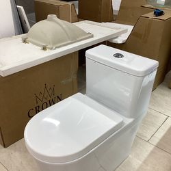 One piece toilet new white color with Softclose seat dual flush system tornado flush fully skirted ready for pick up today