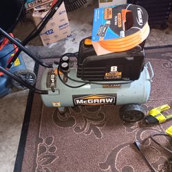Air Compressor With New Hose And Staple Gun