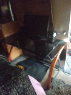 Desk with Monitor and speakers
