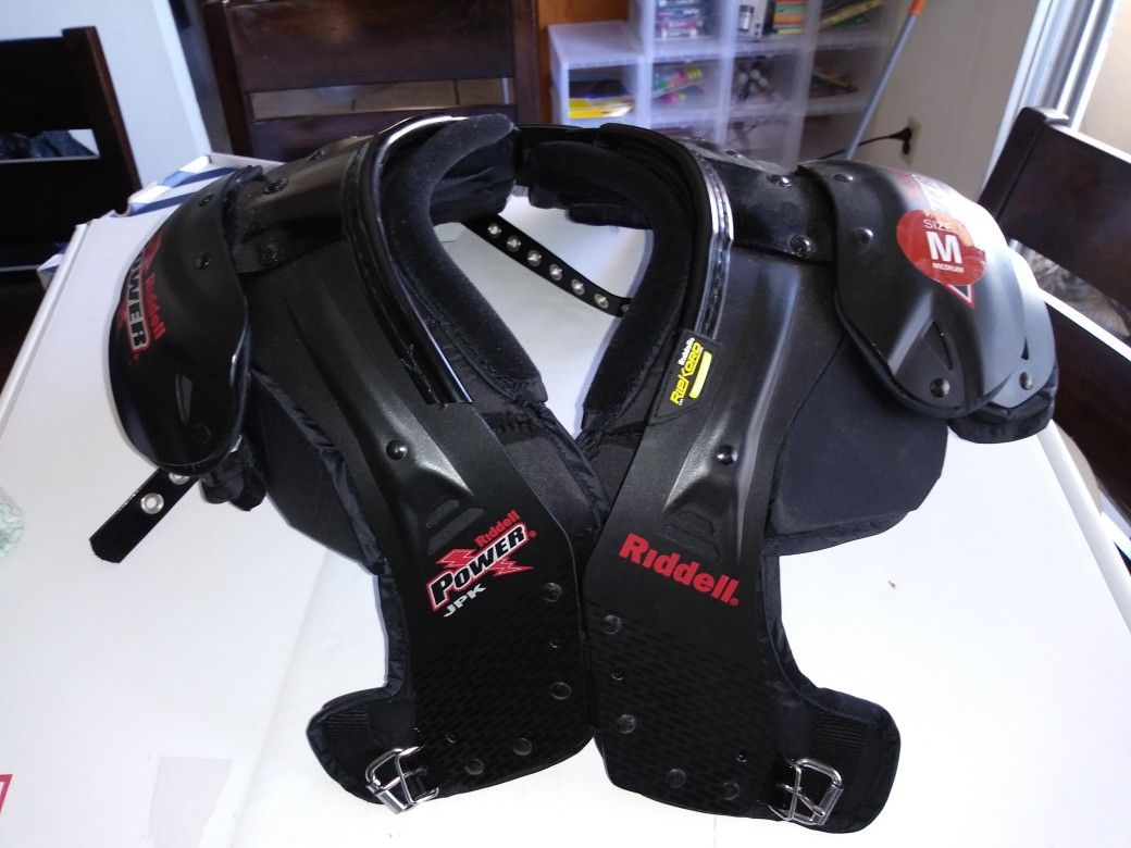 Riddell youth power JPK football shoulder pad. New never used size medium.