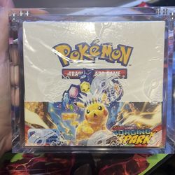 Pokémon surging sparks booster box  with acrylic case