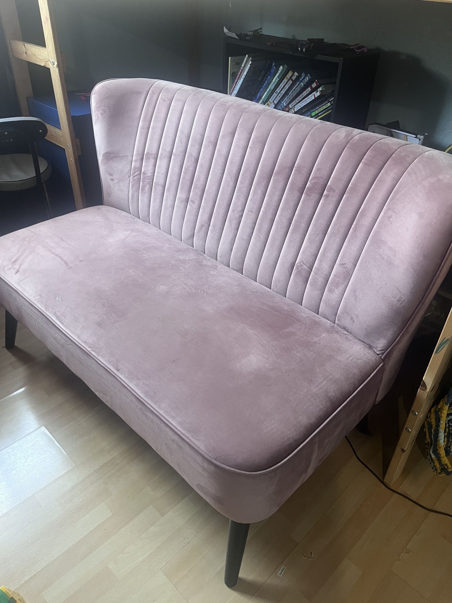 pink velvet sofa