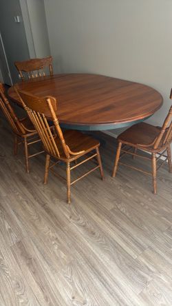 Wooden table with chairs