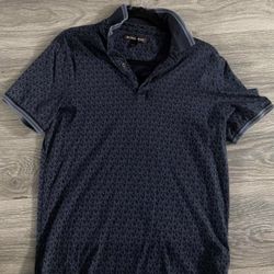 Michael Kors Men's Greenwich Signature Logo Print Cotton Polo Shirt in Navy Blue. 