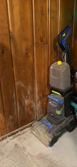 BISSELL TurboClean Upright Carpet Cleaner featuring a dual tank system for clean and dirty water.
