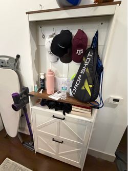 Shoes cabinet with hanger