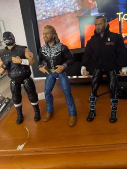 3 AEW wrestling action figures (Cm punk, Adam page, and evil uno