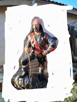 Life-size pissing pirate