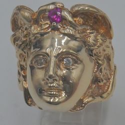 10kt yellow gold ring size 12 26.3 grams with 2 diamonds red stone women's face. 876460-1.