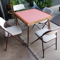 4 Folding Chairs And Folding Table