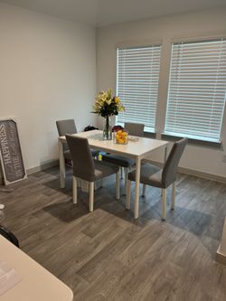Table & 4 Chairs (used)