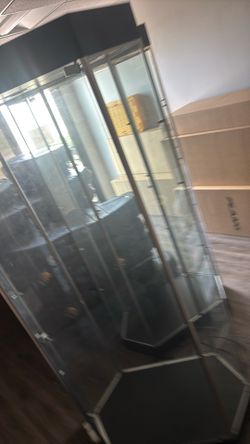 Two large glass display cabinet shelves