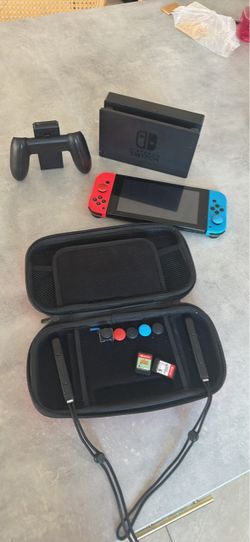 Nintendo Switch con estuche y juegos