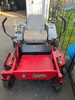 48” 2 mowers both Exmark mowers (zero turn, walk behind)