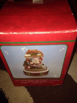 Christmas carol music plays