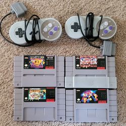 Super Nintendo Games And 2 Controllers 