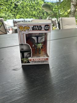 The Mandalorian with child Funko Pop