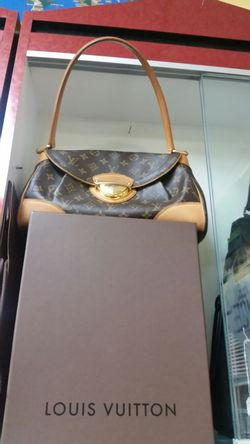 Loui v. Bag. With receipt