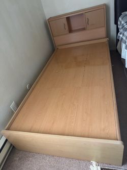 Twin bed with storage and headboard