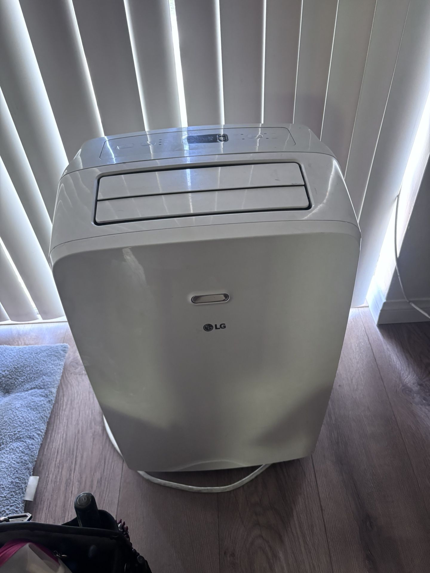 LG 6500 BTU Portable Air Conditioner Cools 300 Sq. Ft. with Dehumidifier