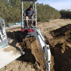 Mini excavator operator