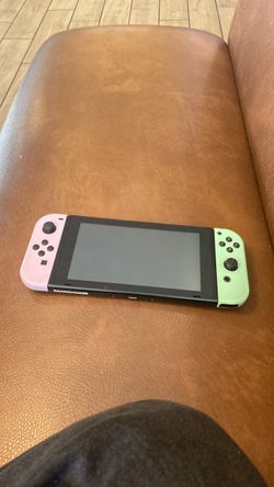 Nintendo Switch with Pink and Green Joy-Cons
