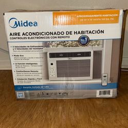 Midea 5,000 BTU Room Air Conditioner with electronic controls and remote