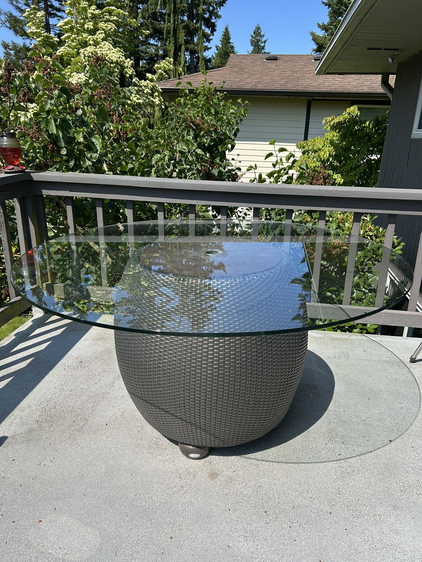 Outdoor Round Wicker Table with Glass Top – $75