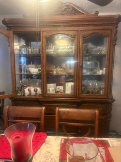 Table with chairs and China cabinet