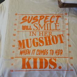 Suspect will smile in her mugshot when it comes to her kids.