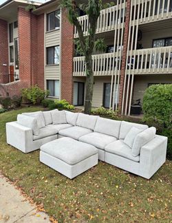Light Gray Modular Sectional Sofa with Ottoman