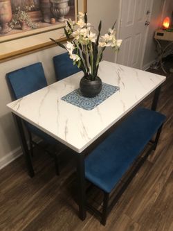 Like new White faux marble dining table set with 2 blue fabric chairs and a Bench