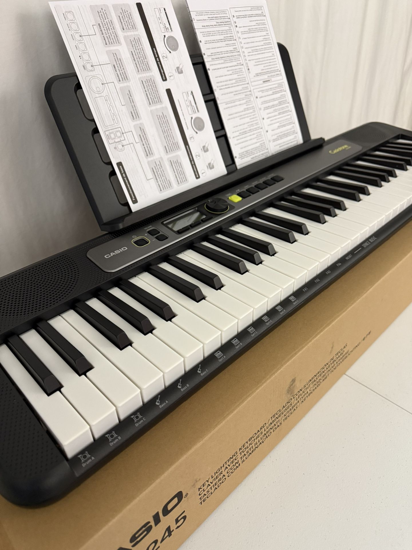 Casio Casiotone 61-Key Lighted Keyboard With Sustain Pedal, Protective Case Bundle