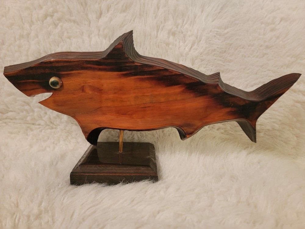 A vintage mounted hand-carved wooden shark sculpture that also functions as a pen holder 21.5" width x 11" height