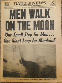 1969 newspaper men walk on the moon