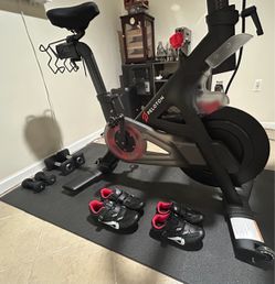 Peleton bundle with dumbbells, weights, men and woman clip in sneakers, cushion seat, or can sell separate smoke free home