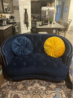 Golden and blue circular pillows