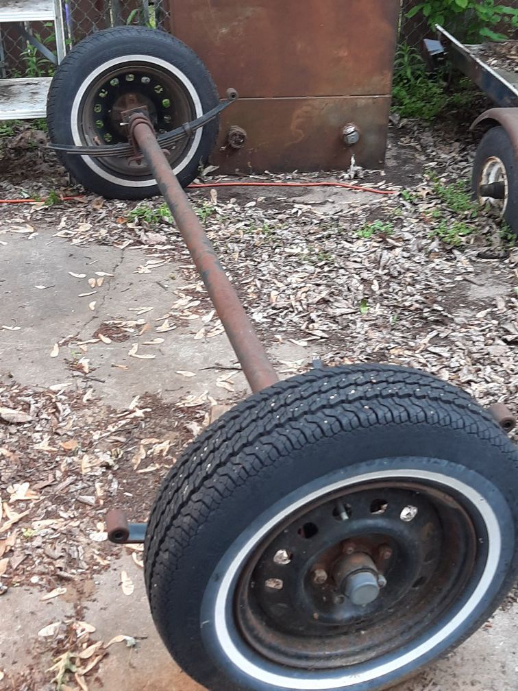 Axle with tires for trailer