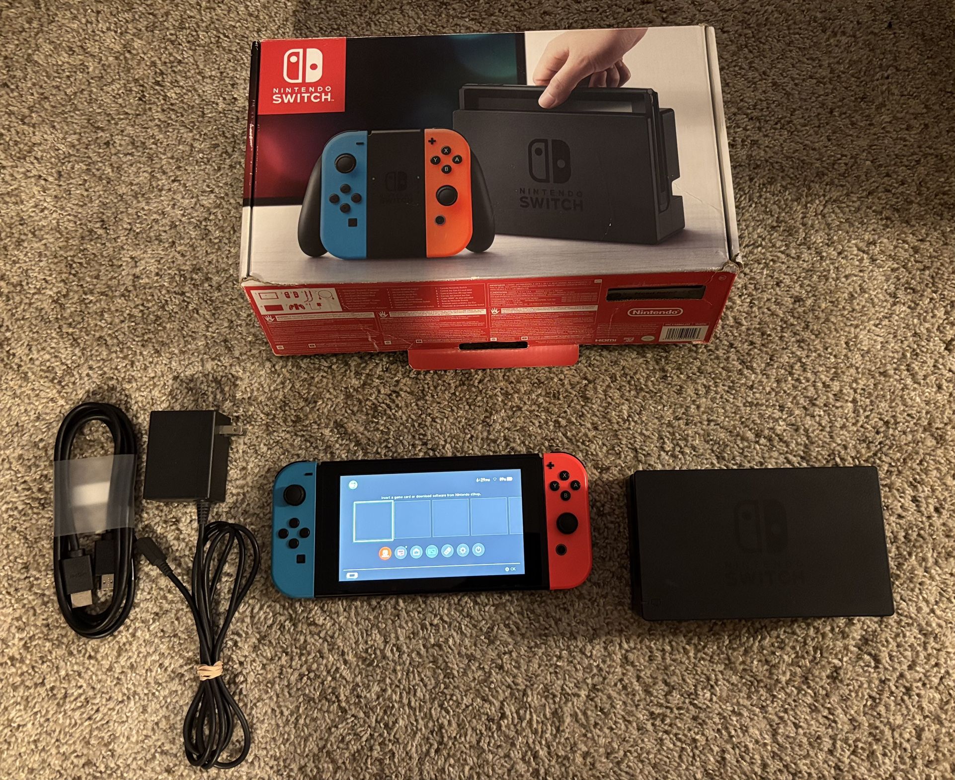 Unpatched Nintendo Switch V1 with original box, dock, cables, & 32 gb memory card