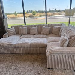 Sectional With Pull Out Bed And Storage Chaise