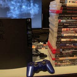 PS3 Slim  + 25 Games In Great Condition