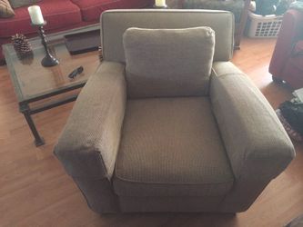 Oversized neutral color occasional chair.