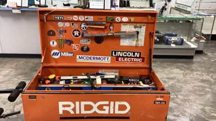 Rigid tool box full of various tools