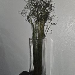 a vase with branches 