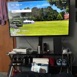 55’ TCL Roku TV With 3 Layer Tv Stand, Tv Attaches To The Tv Stand. 
